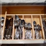 K24. 97 piece stainless steel Calderoni flatware set. - $950